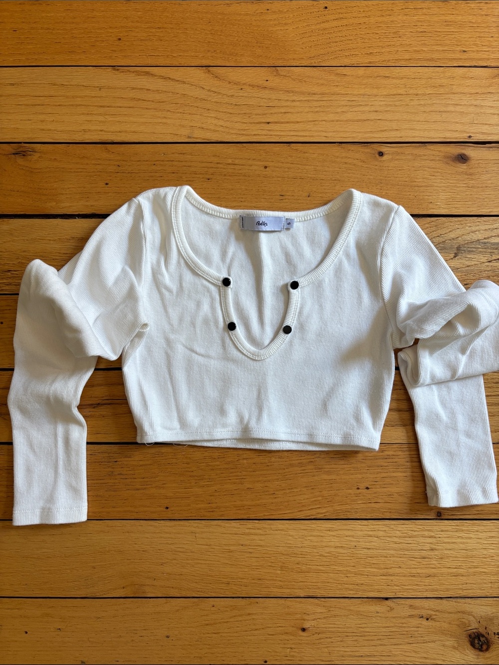 Adika White Ribbed Scoop-Neck Cropped Long Sleeve Top with Black Button Accents